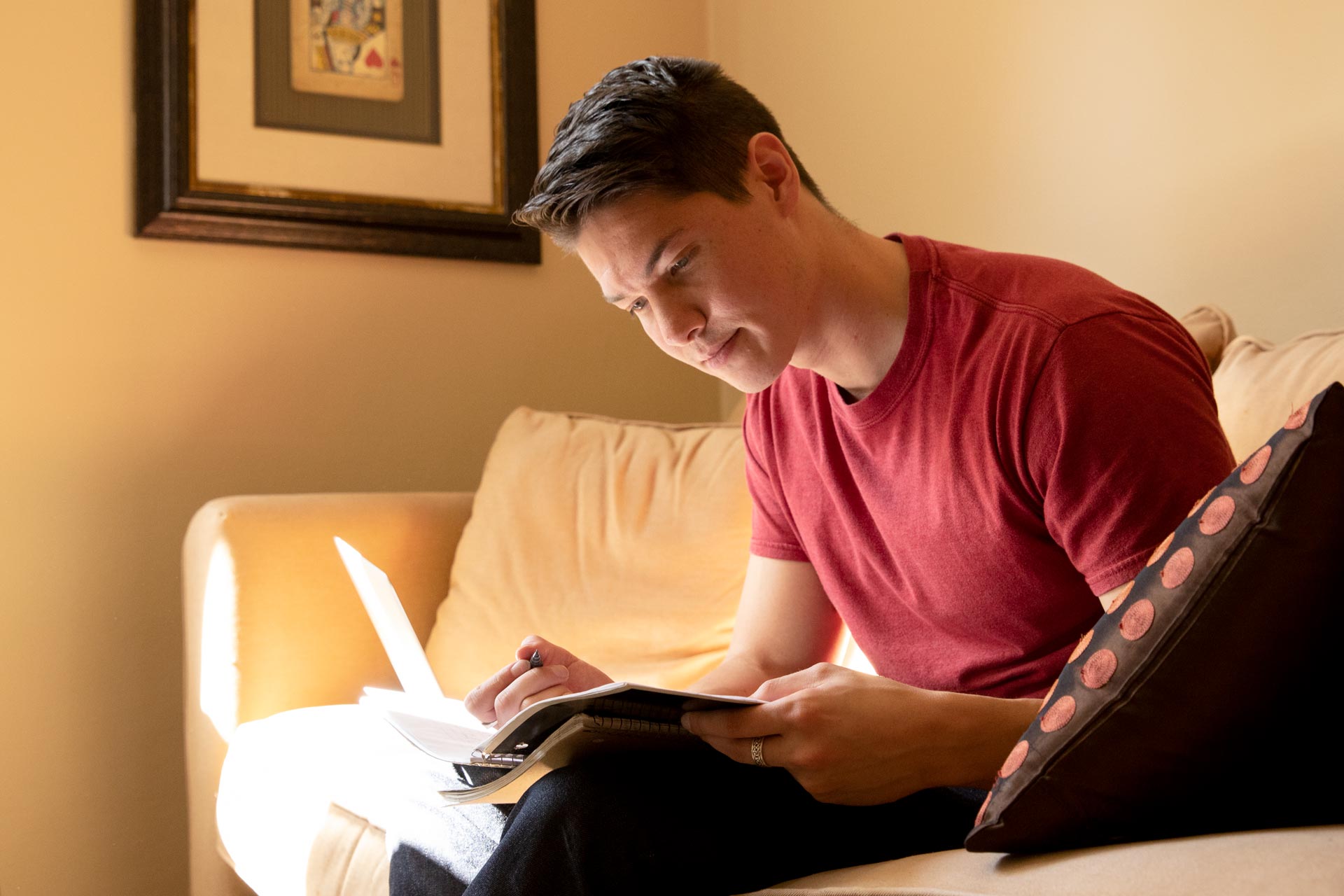 College student researching options to pay for college using scholarships.