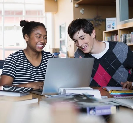 Collaborative students at a desk