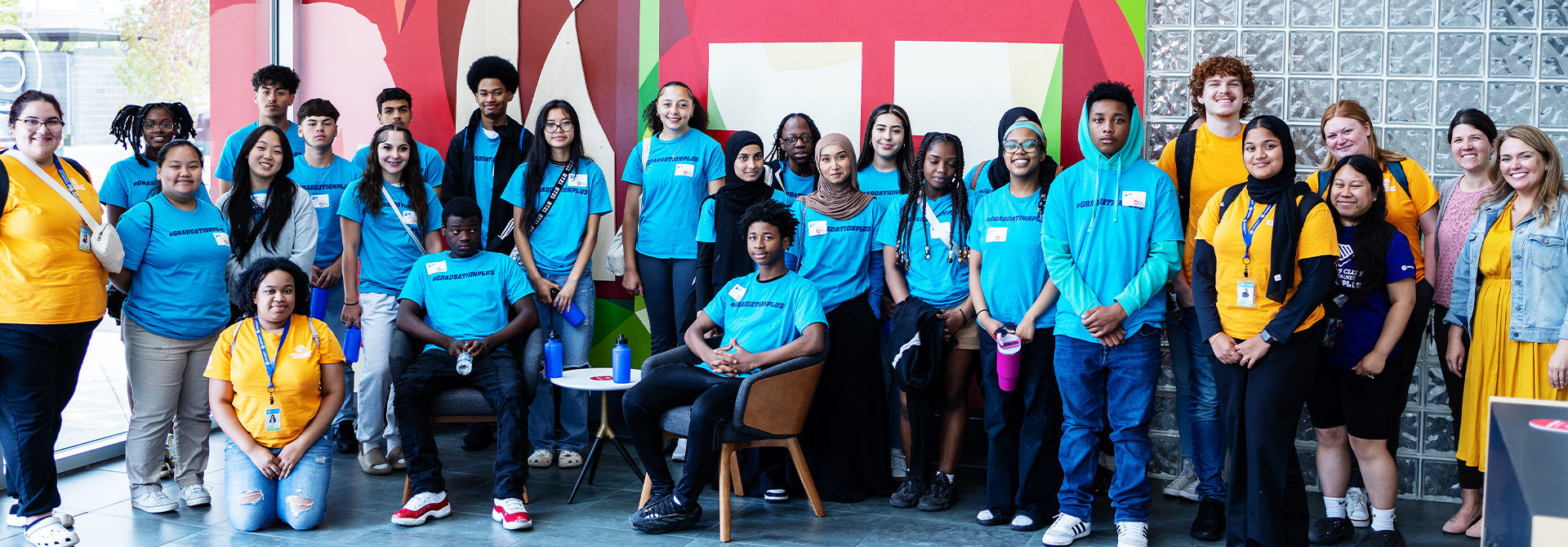 Teens from the Boys & Girls club of Milwaukee are pictured in a large group.