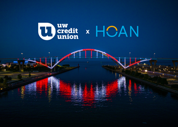 The Hoan Bridge in Milwaukee illuminated with white and red lights.